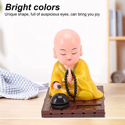 Image of AUGEN Small Buddhist Monk Solar Ornaments, Automatic Nodding Lucky Meaning Light Energy Sensing Eco Friendly Solar Buddhist Monk Statue Decoration for Home Car Dashboard (Pack of 1)(D, Yellow)