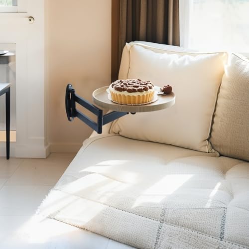 Table murale ronde pliante pour un coin repas de studio optimisé