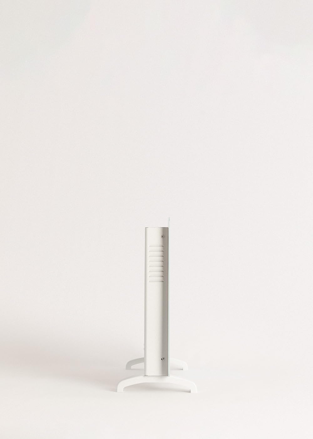 Side view of the CREATE/WARM CRYSTAL 2000W Convector Heater, highlighting its slim profile and ventilation grilles.