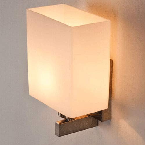 Libérez votre table de chevet grâce à cette lampe murale de lit multifonction