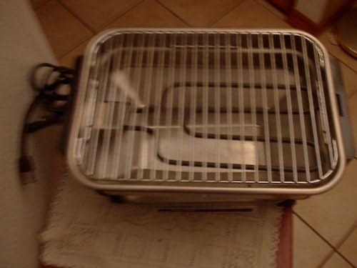 Szczyt view of Farberware Electric Rotisserie Mini Grill showing grill grate and heating element