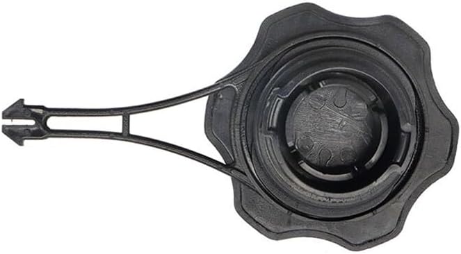 Taobh thíos view of the black replacement fuel tank cap, showing the threads and sealing gasket.
