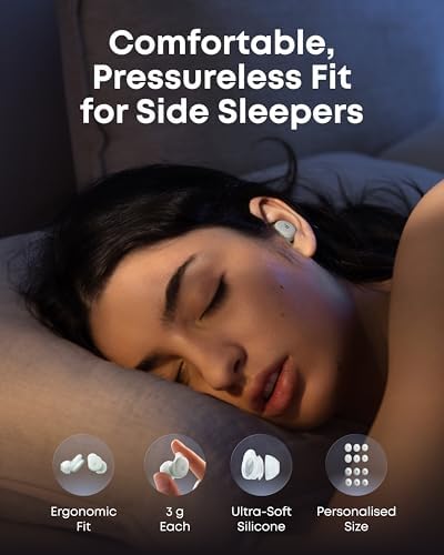 A person sleeping peacefully on their side, wearing the discreet soundcore Sleep A30 earbuds.