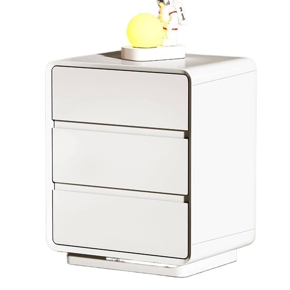 Table de chevet blanche à tiroirs pour optimiser le rangement des petits espaces