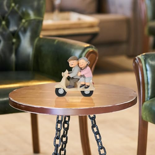 Figurine couple âgé à moto pour égayer un intérieur trop terne