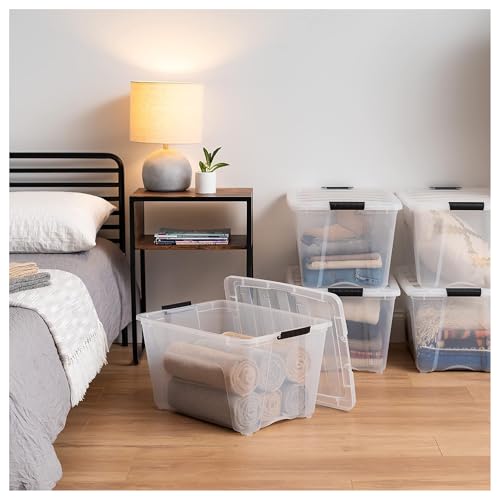 Image of IRIS USA 54 Qt Stackable Plastic Storage Bins with Lids, 12 Pack - BPA-Free, Made in USA - See-Through Organizing Solution, Latches, Durable Nestable Containers, Secure Pull Handle - Clear