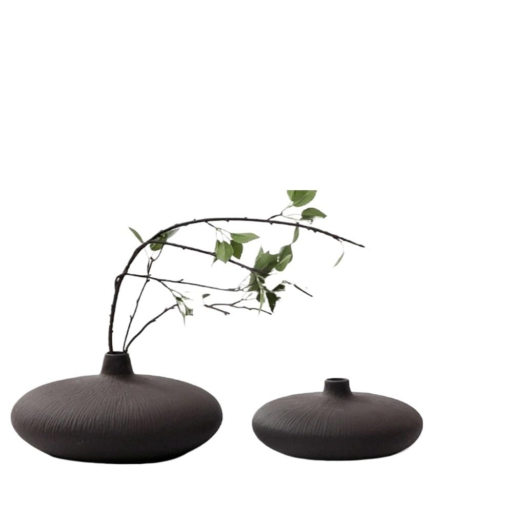 Vase en céramique et verdure artificielle pour une ambiance zen au bureau