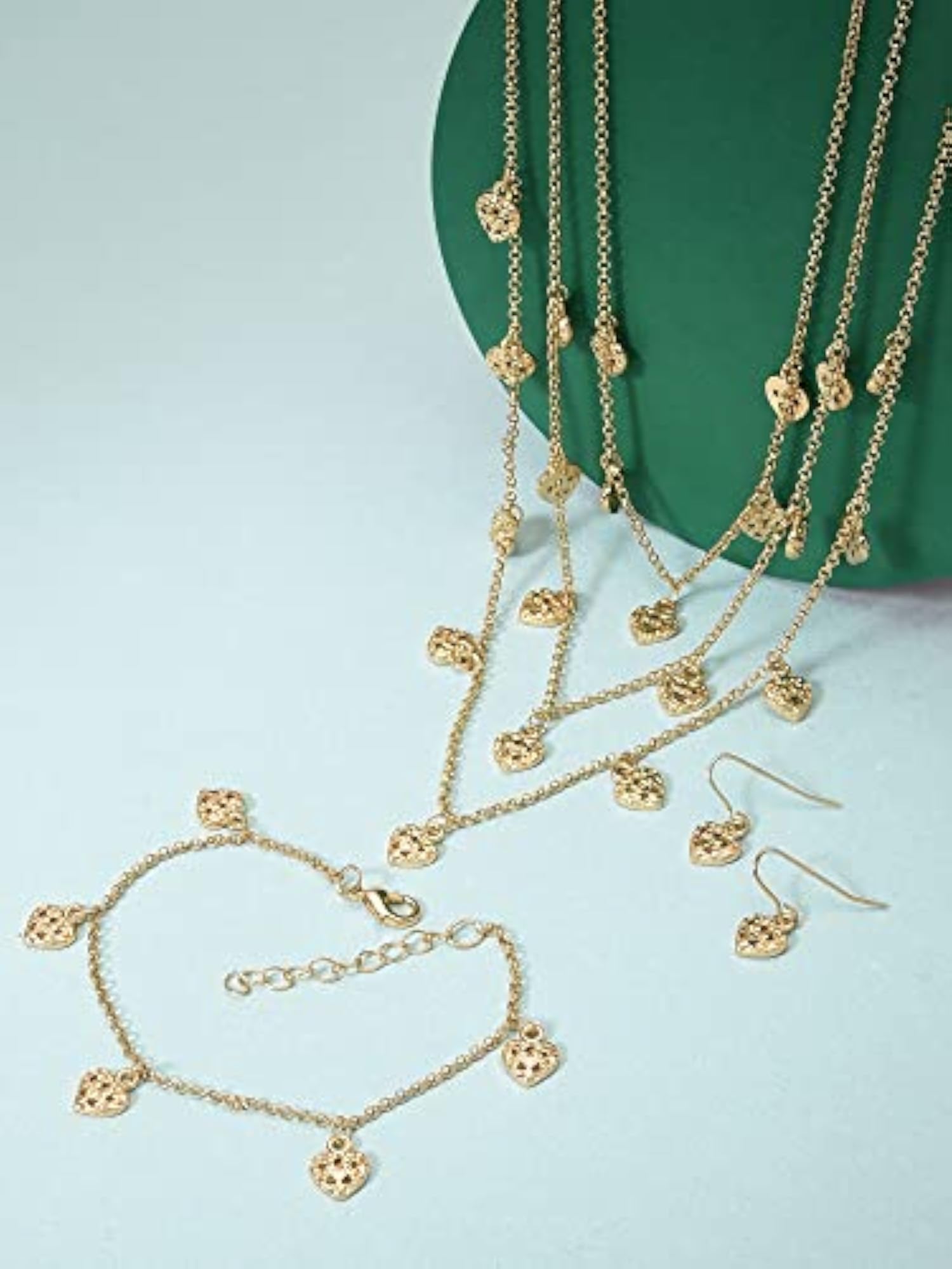 Women's Gold Tone Dangling Hearts Earring and Bracelet Set