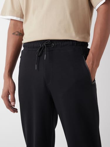 Image of Bewakoof Men's Solid Oversized Fit Cotton Poly Joggers