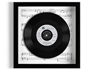 Number one hit from the Official UK Top 40 chart for the week ending 20 December 1986. This is the genuine 7" record, raised within the frame, giving a fantastic 3D 'floating' effect. This is surrounded by either plain white cartridge paper or sheet ...