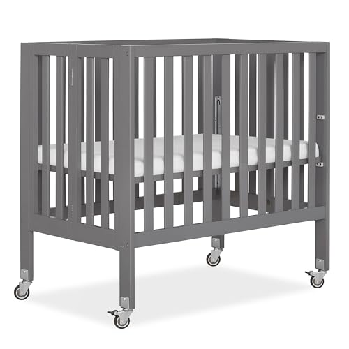 Image of Dream On Me Jett Mini Folding Baby Crib in Steel Grey, GreenGuard Gold & JPMA, Lightweight & Portable, Patented Flat Folding System for Small Spaces & Travel, 1.5” Mattress Pad, 3 Heights, Safe Wheels