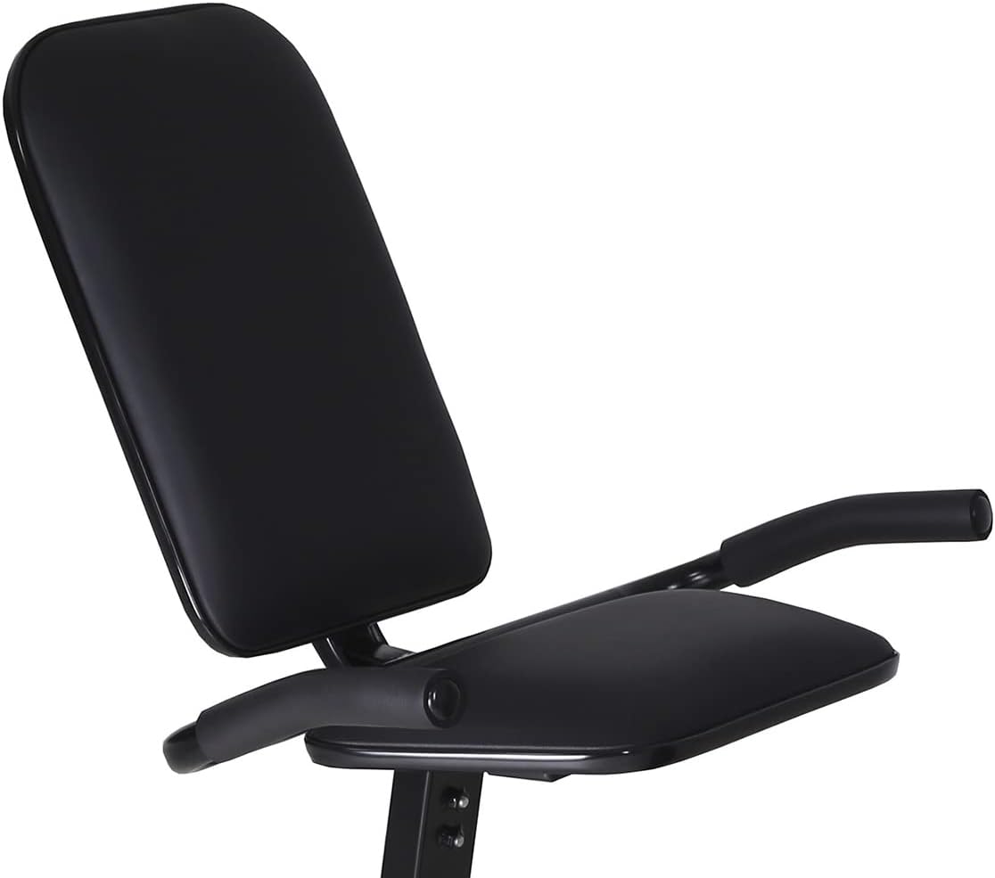 Imagem lateral da bicicleta ergométrica com fundo neutro.