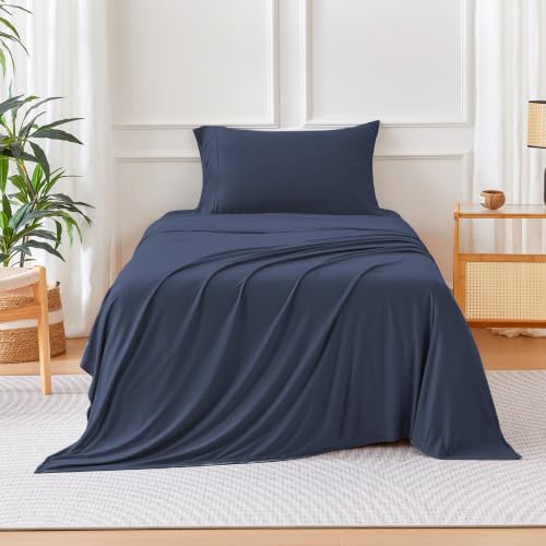 Image of Amazon Basics Jersey Knit 3-Piece Sheet Set, Wrinkle Resistant and Easy Fit, Includes 16 inch Deep Pocket Fitted Sheet, 1 Flat Sheet and 1 Pillowcase, Twin, Navy Blue
