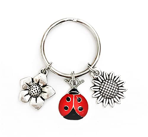 Ladybug theme keychain. Includes two flower varieties and a colorful ladybug charm. Good luck gift. Lady Bug Keepsake Keychain.