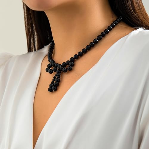 Collier perles blanches noires ajustable contre les fermoirs durs