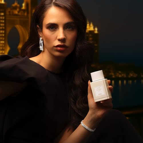 Image of Ajmal Oud Marquis Oud Plaisir Eau de Parfum for Women, 3.4 fl oz | Rich oud-floral women's EDP by Ajmal. Indulgent, long-lasting luxury. Crafted in Dubai, made in France.