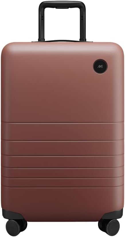 Monos Carry-On Plus Luggage (23"), Lightweight Hardside Spinner Suitcase with TSA Lock, Airline Approved, Terracotta, Red