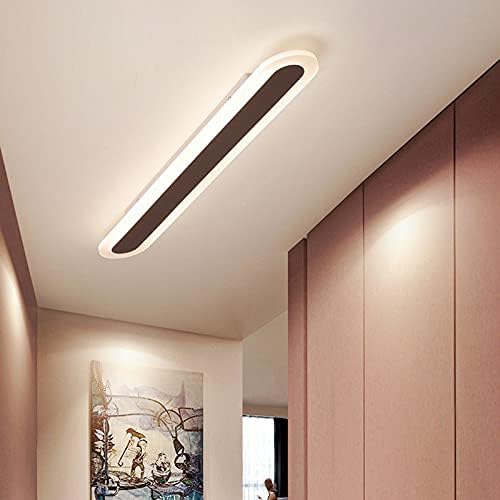 LITFAD 47-inch Oblong LED Flushmount Ceiling Light illuminating a hallway or corridor, showcasing its modern aesthetic.