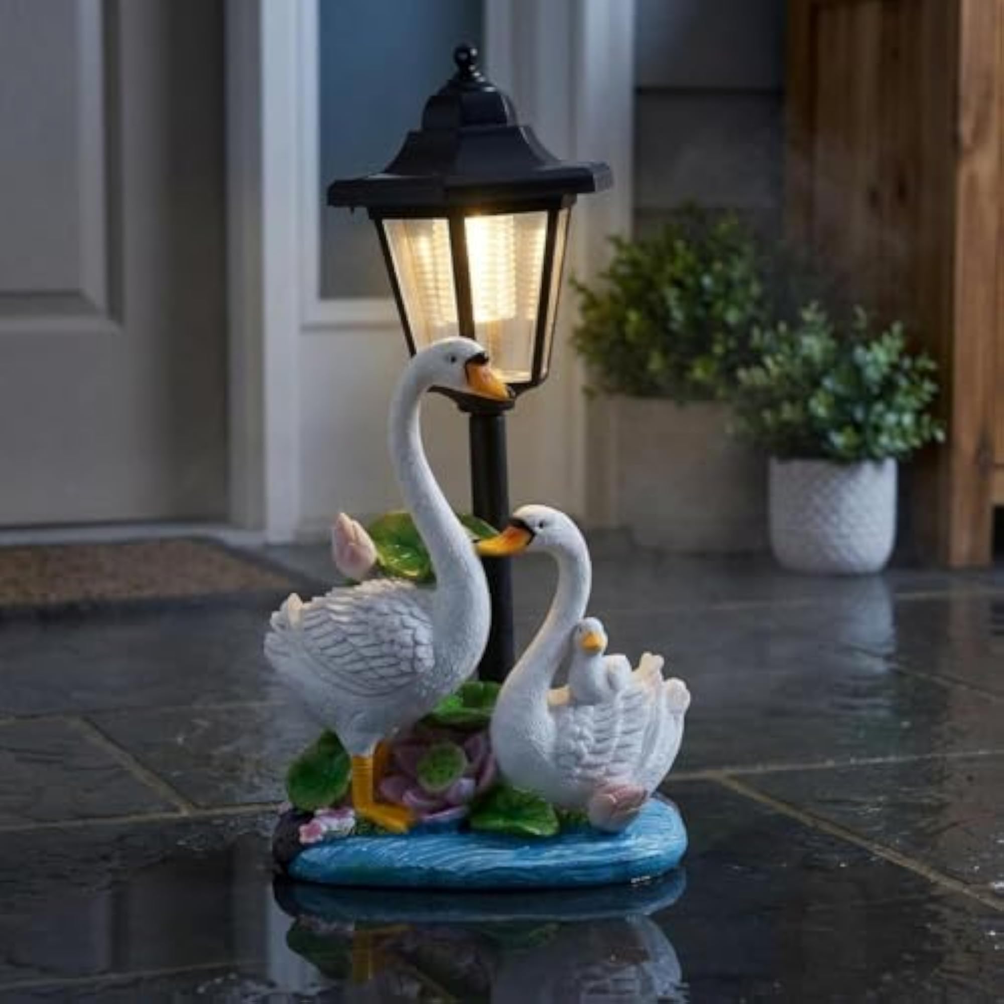 Sun-Powered Garden Lantern with Animal Themed Base and Clear Panels