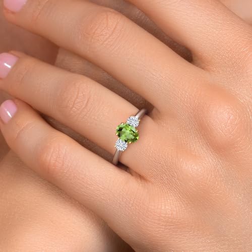 Gem Stone King 10K 2 Tone Gold Green Peridot and White Moissanite 3-Stone Engagement Ring For Women | 1.22 Cttw | Oval 7X5MM and Round 3.5MM | Available in Size 5,6,7,8,94