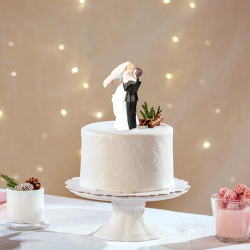 Figura de novios abrazándose para evitar caídas en tartas de boda delicadas 4