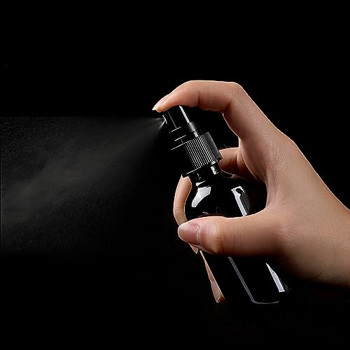 Image of NOOEEISS Black Glass Small Spray Bottle 2 oz 24Packs,Fine Mist Sprayer Small Clear Bottles,Refillable Containers mini spray bottles for Cleaning Solutions and Skin Care (Black 24pcs)