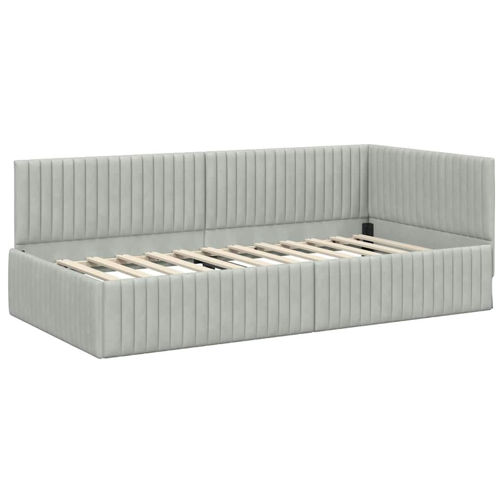 Struttura letto angolare in velluto grigio chiaro con materasso 2 pezzi supporto robusto e testata montata a parete ideale per camere moderne e funzionali