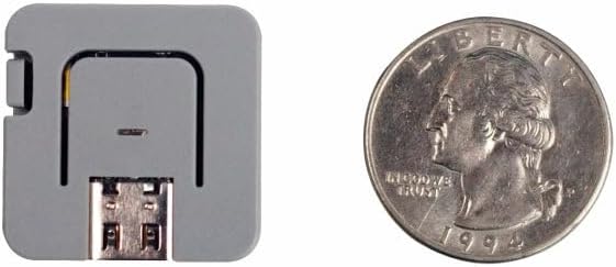 M5Stack ATOM Lite size comparison with a US quarter