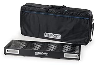 Pedalboard with gig bag Pedal board: colour: black (powder-coated) Material: aluminiumfor 20 to 30 effects pedals (depending on size) slotted surface design for easy pedal mountingmounting point for Rockboard LED Light (Not included) Width: 1002mmDep...