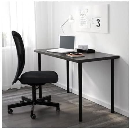 IKEA LINNMON desk with white top and black ADILS legs in a minimalist workspace