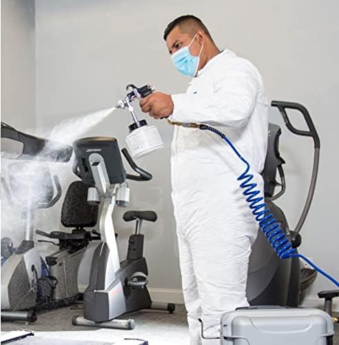 Operator using BioSpray 5 in a gym setting