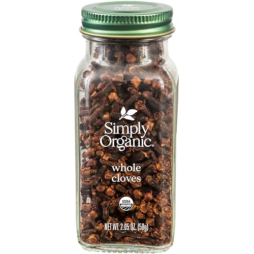 Bottle of simply organic whole cloves on white background