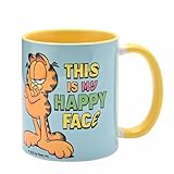 garfield coffee Design humoristique : avec des illustrations amusantes d'un Garfield grincheux et la phrase « This is my happy face », cette tasse combine des motifs lumineux et de l'humour. Son design accrocheur ajoute une touche amusante et élégante à votre routine matinale de café ou de thé.