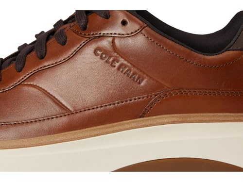 Cole Haan Mens Grandpro Featherarc Bike Toe Sneaker, British/Ivory/Hickory, 10-M US