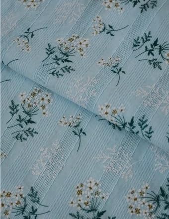 Tissu pur coton jacquard brodé pour coudre une robe chargée d'histoire