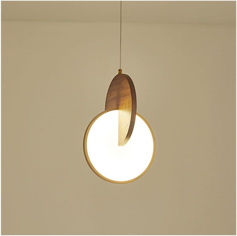 Lampe suspendue de chevet pour créer une ambiance chaleureuse de chambre