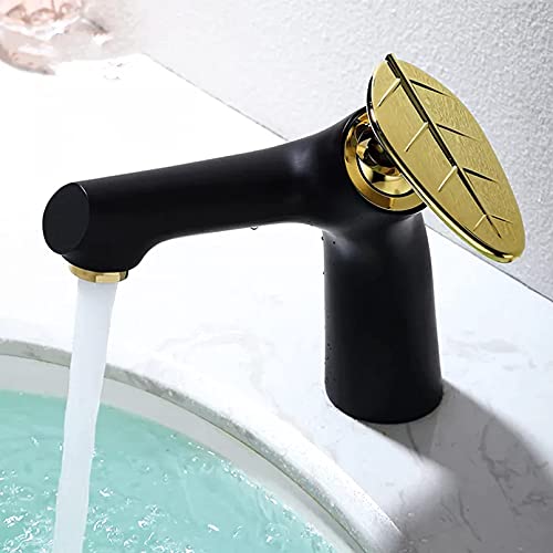 Robinet de lavabo noir et or pour rénover une salle de bain moderne
