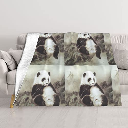 Couverture thermique douce panda contre le froid sur le canapé - 2