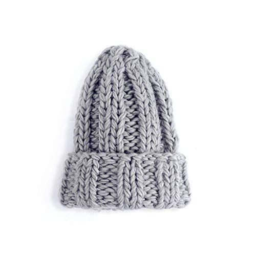 Bonnet tricoté pour femme le chapeau d'hiver chaud et épais en maille torsadée solide