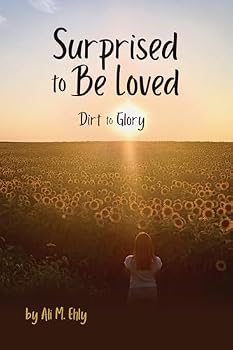 Paperback Surprised to Be Loved: Dirt to Glory Book