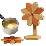 Design moulin à exclusivité : ce dessous de plat en bois fait à la main arbore un design exclusif en forme de moulin, créant une pièce distinctive entre les dessous de plat chauds qui protège les tables de la chaleur en insufflant élégance dans le décor des repas ; les détails sculptés amusants mais sophistiqués le rendent idéal pour mettre en valeur ou les repas intimes, offrant à la fois utilité et valeur esthétique grâce à son caractère de table à la beauté naturelle