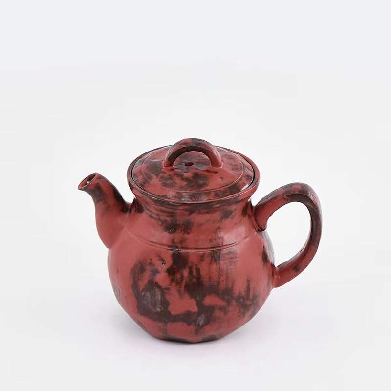 Tetera de cerámica tradicional para preparar té en la cocina 5