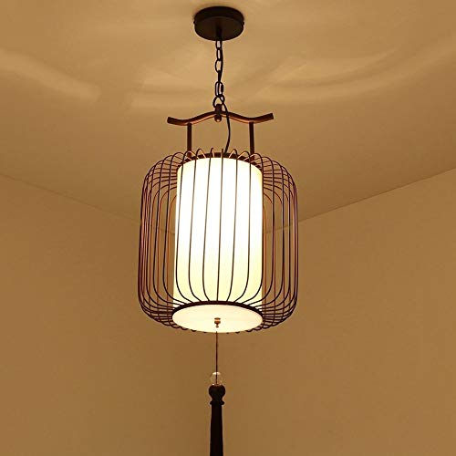 Suspension cage à oiseaux pour créer une ambiance de restaurant chinois
