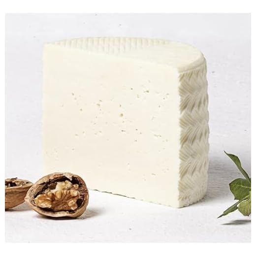 QUESO ROMERO OCAÑA TIERNO QUESO ROMERO OCAÑA TIERNO "Disfruta del sabor suave y auténtico del Queso Romero Ocaña Tierno de leche pasteurizada de oveja - ¡Una delicia en cada bocado!"