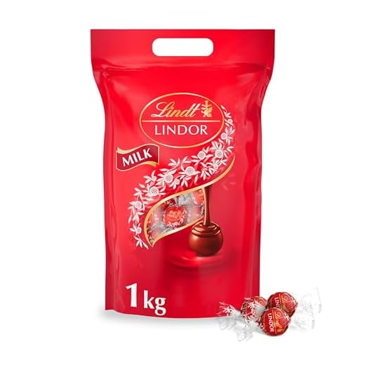 Lindt LINDOR Praliner Mjölkchoklad - påse ca. 80 st kulor, 1 kg - Dela och njut tillsammans - Chokladkulor med len och krämig fyllning