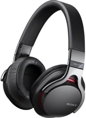 Person holding Sony MDR-1R headphones, demonstrating fit