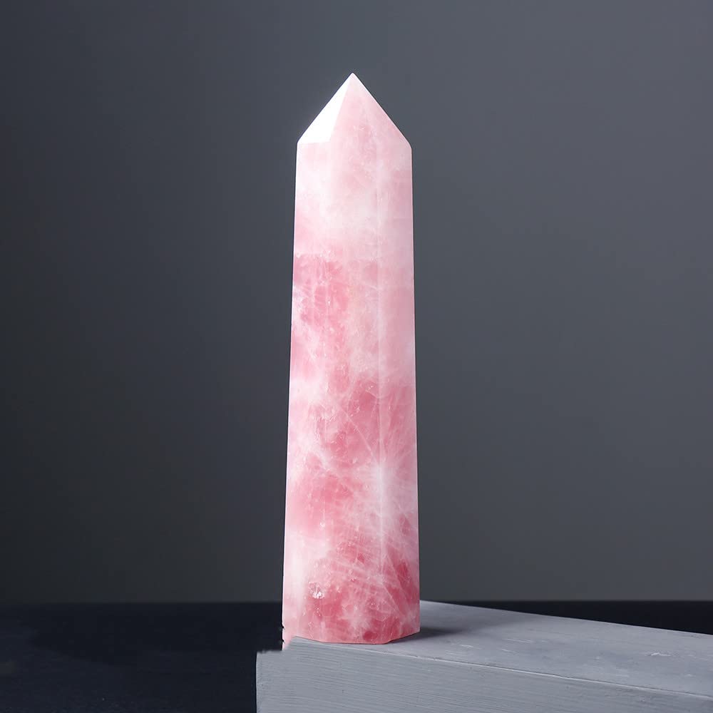Punto de cuarzo rosa grande prisma hexagonal de gema