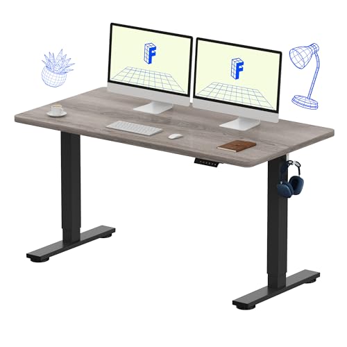 Image of FLEXISPOT EN1 One-Piece Standing Desk, Electric Adjustable with 4 Memory Presets, 176 LBS Capacity, Stable & Quiet, Seamless Desktop for Home Office & Dual Monitors, 55 inchx28 inch Gray Wood