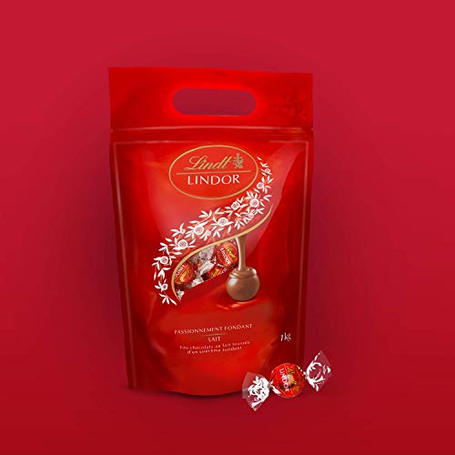 Lindt Lindor zakje met melkchocoladetruffels, ca. 80 ballen, 1 kg, perfect om te delen, chocoladeballetjes met een zacht smeltende vulling - Image 4