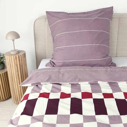 Parure de lit réversible mauve et prune pour une chambre moderne